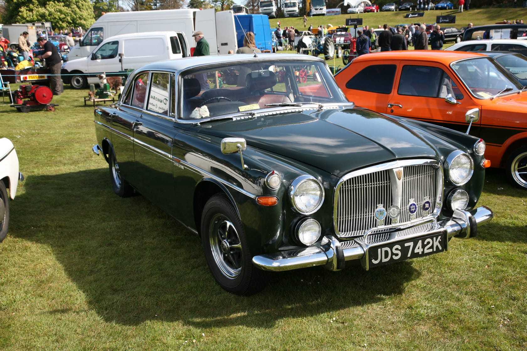 A dark green 1972 Rover P5B 3.5-litre V8 coupe at a classic car show, front three-quarter view, UK registration JDS 742K