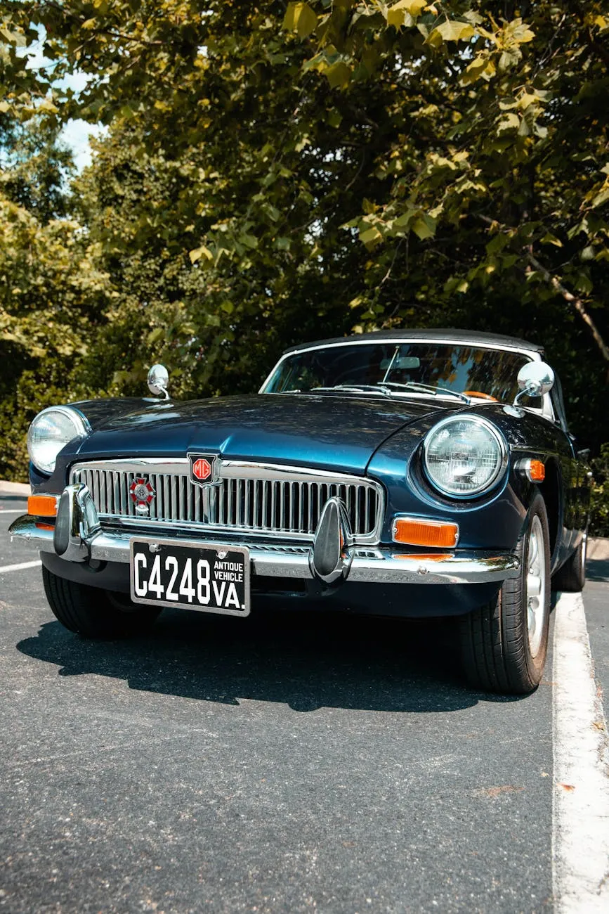 A dark blue MG MGB, front three-quarter view