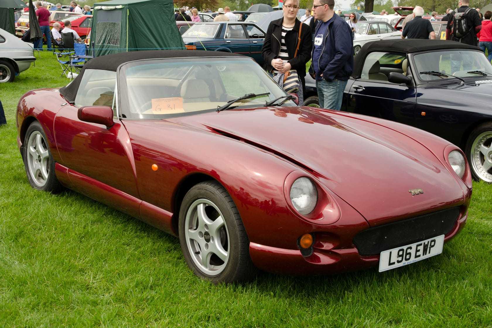 A dark red 1994 TVR Chimaera 4.0 with UK registration L96 EWP, front three-quarter view at a classic car show