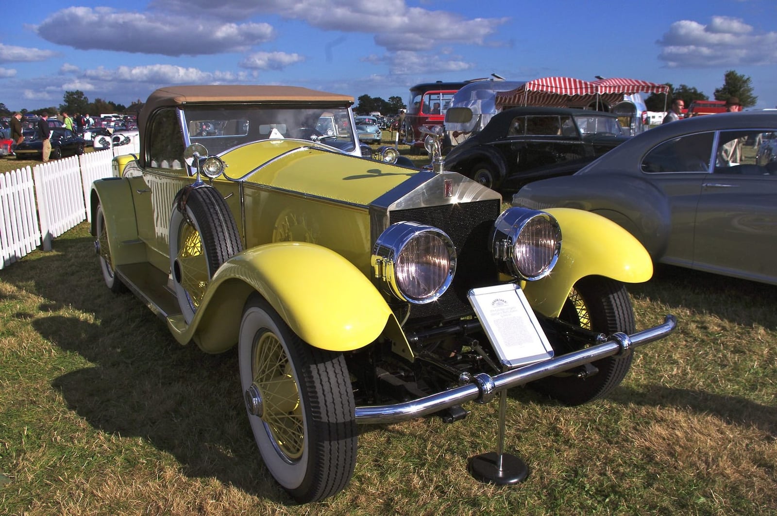 A yellow 1926 Springfield Rolls-Royce Silver Ghost Playboy roadster at a show