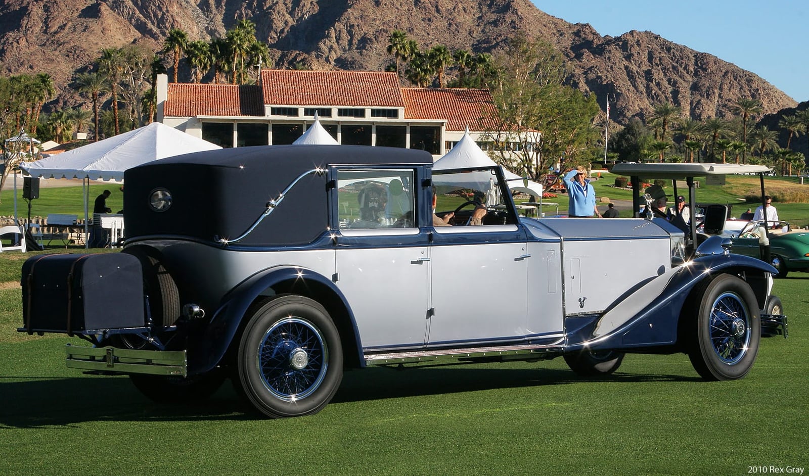 A silver and navy 1930 Rolls-Royce Phantom II with Brewster town car coachwork