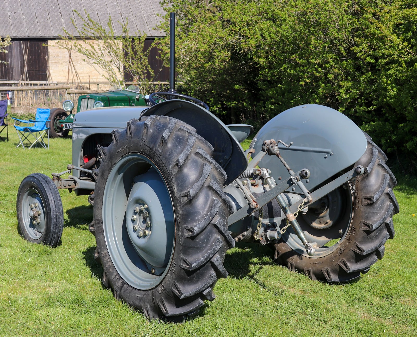 A grey Ferguson TE20 seen from the rear, the three-point linkage and drawbar visible