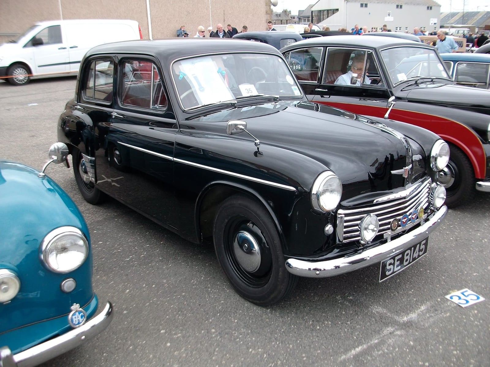 A black 1953 Hillman Minx Mk V saloon at a UK classic car show