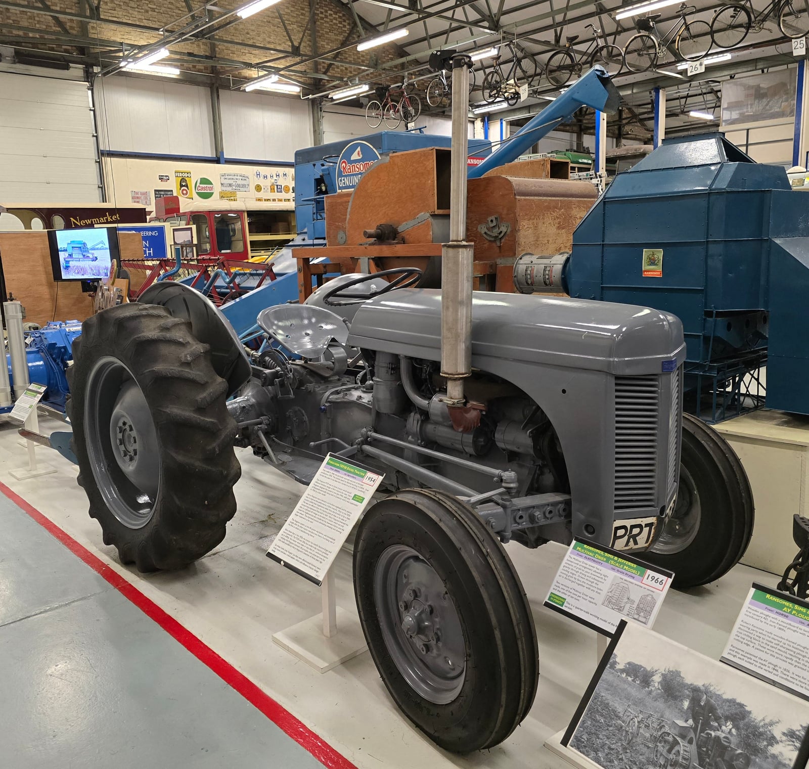 A grey Ferguson TEF20 diesel tractor at a museum, side three-quarter view