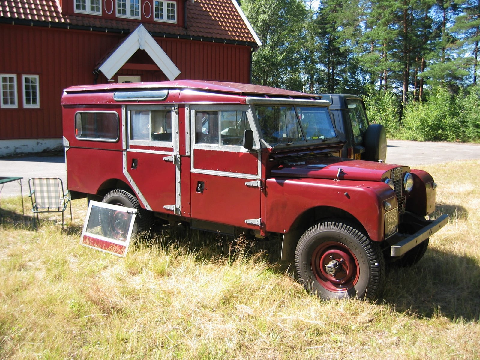 The front of a 1957 Land Rover Series I station wagon
