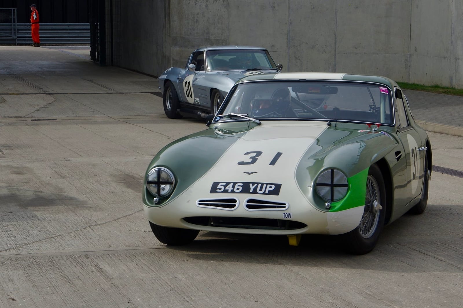 A green and white 1958 TVR Grantura Mk1 with Coventry Climax power and racing number 31