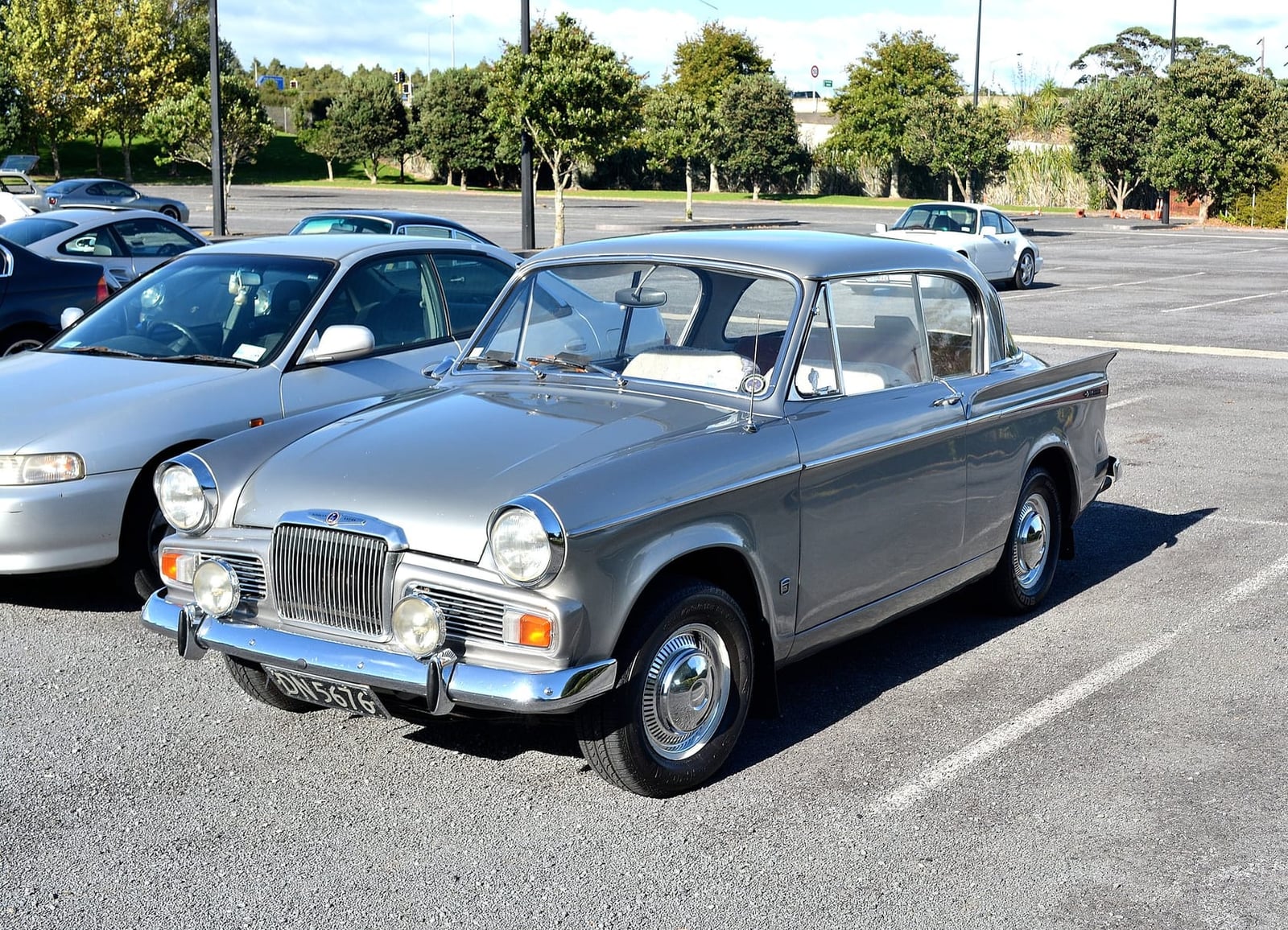 A silver-grey Sunbeam Rapier Series saloon, front three-quarter view