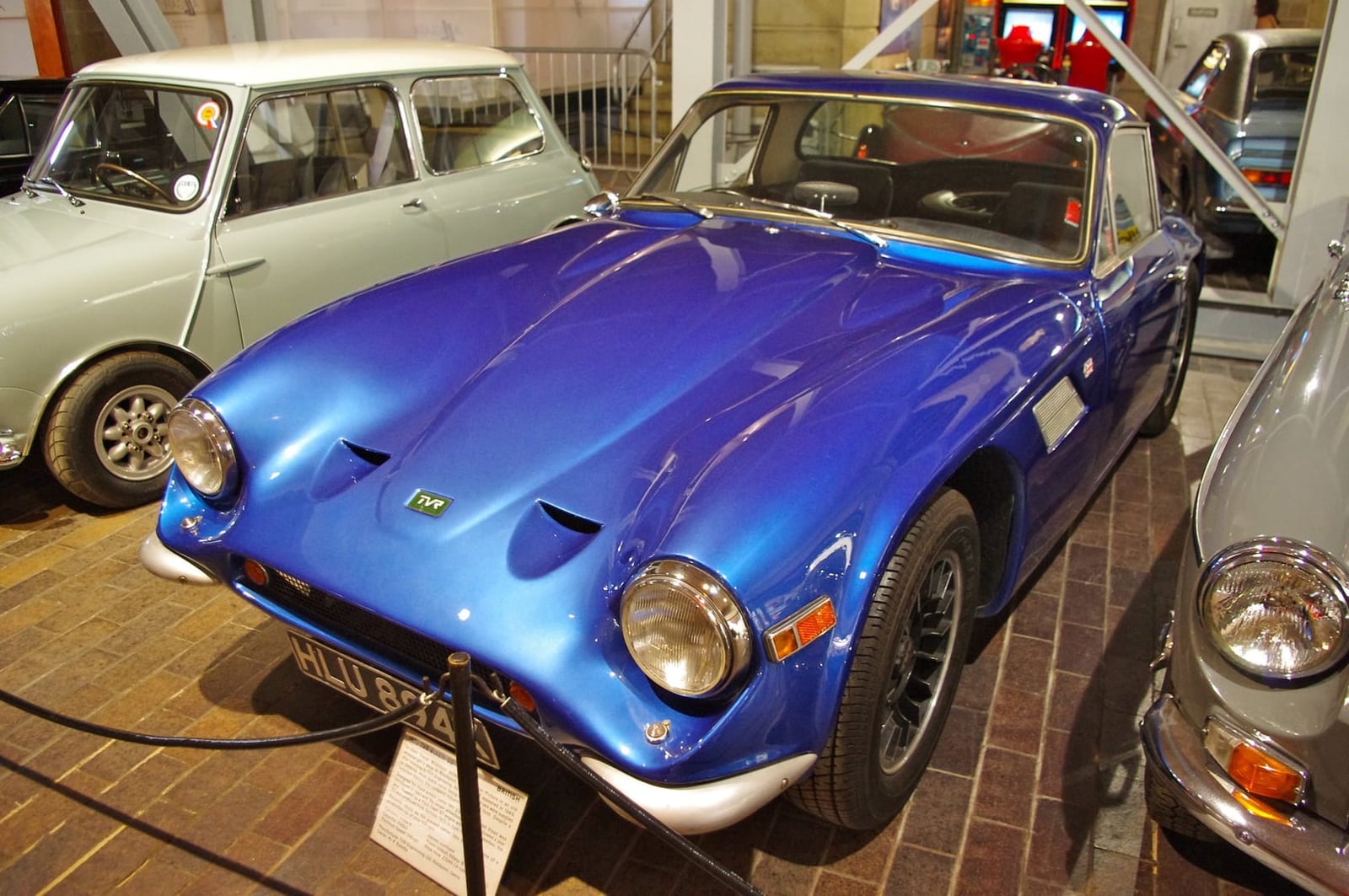 A blue 1970 TVR Vixen S3 displayed in a museum