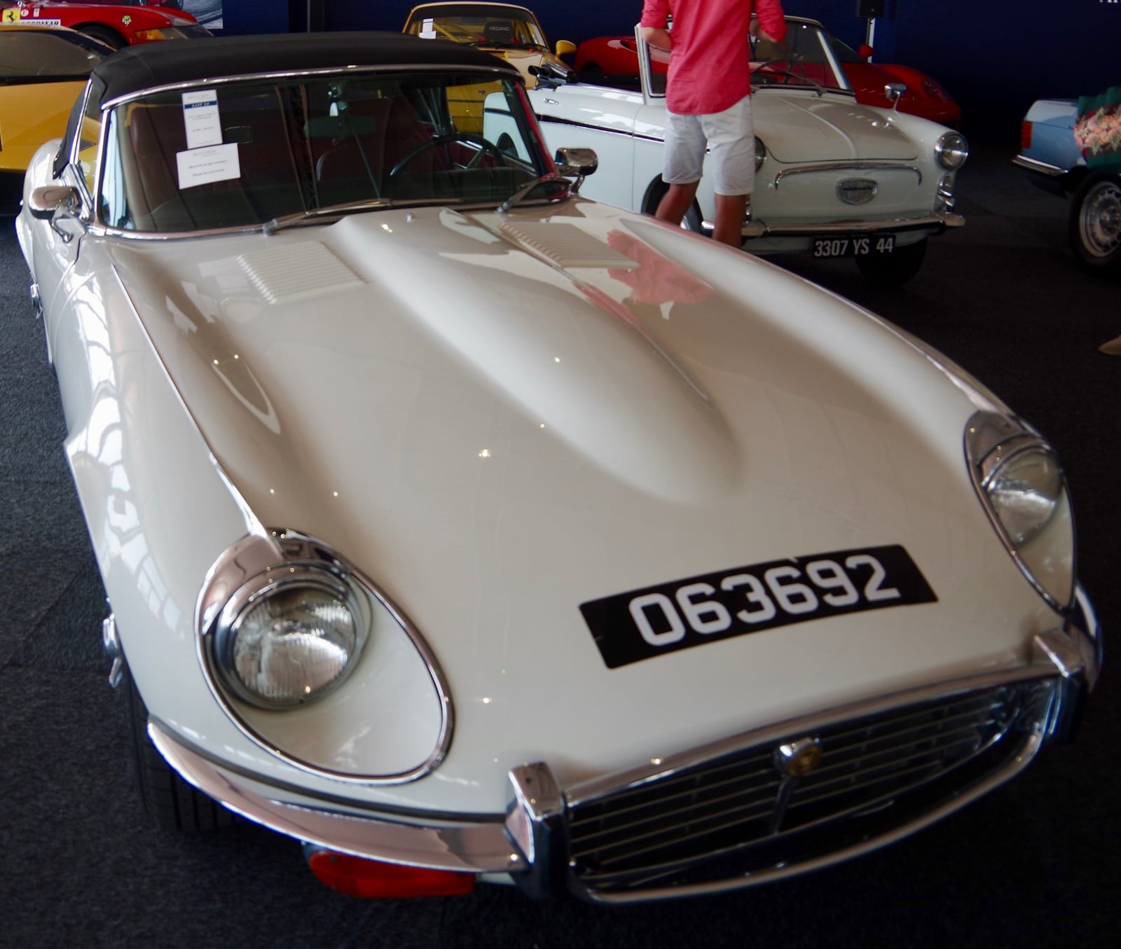A cream Jaguar E-Type Series 3 V12 roadster, front three-quarter view