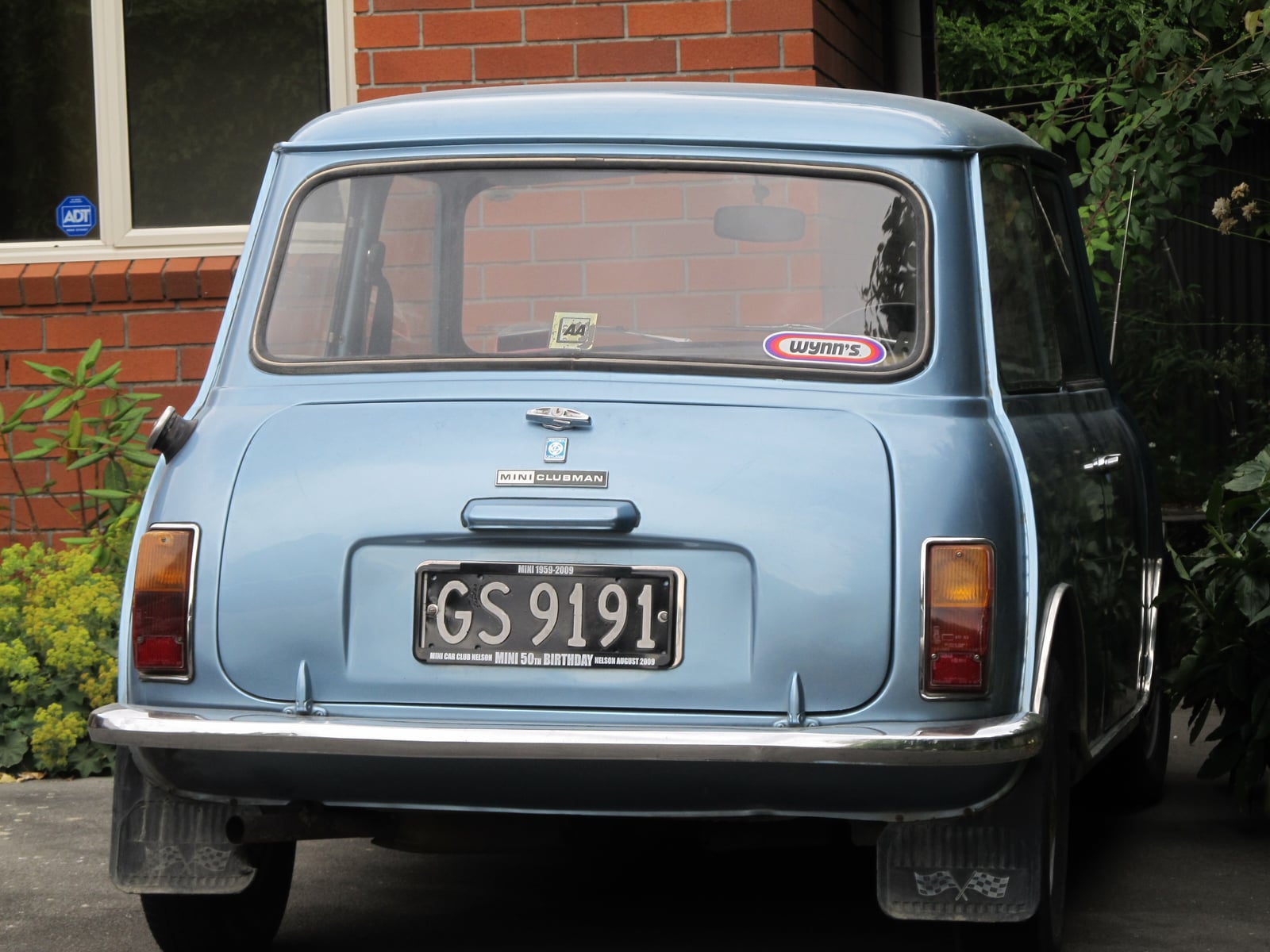 A light blue Austin Mini Clubman saloon, rear view