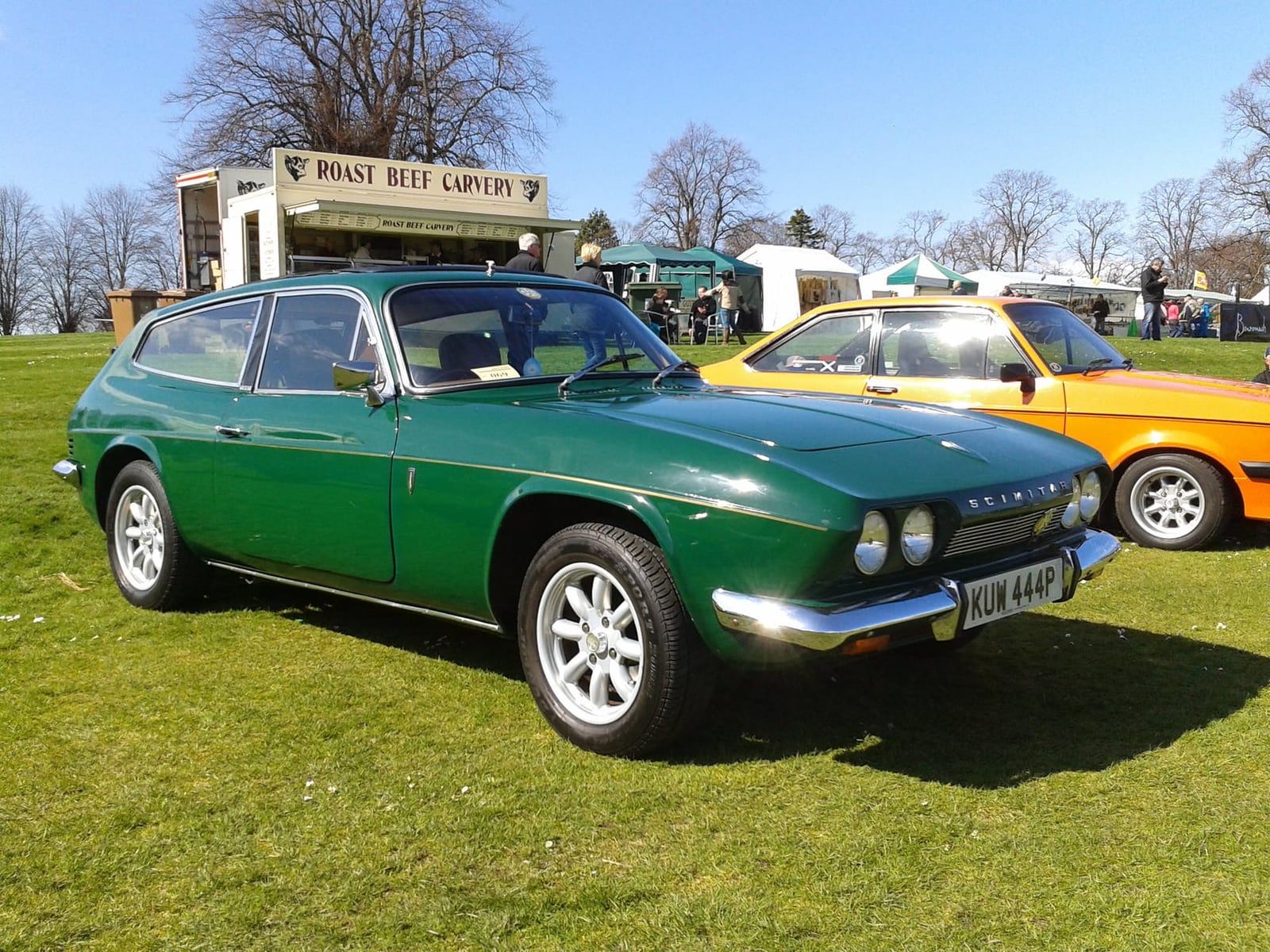 A white Reliant Scimitar GTE parked on a driveway, front three-quarter view, UK registration C234 EPP