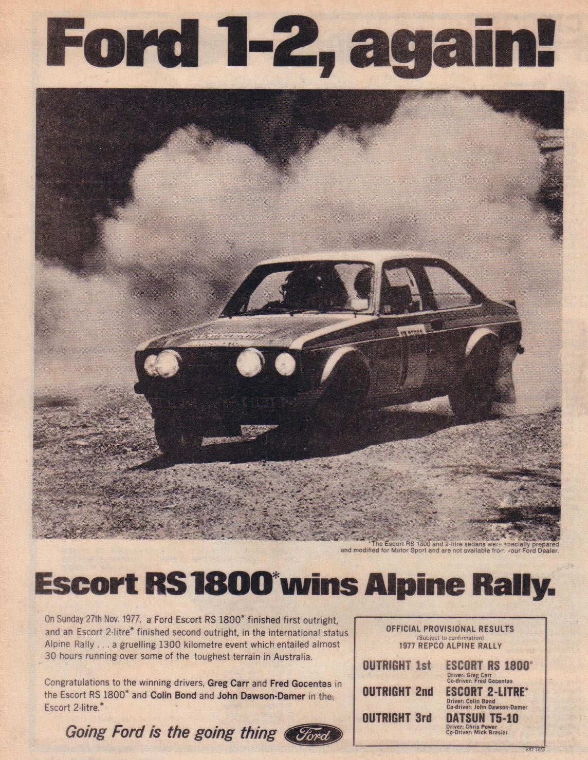 A period Ford advertisement headed Ford 1-2 again, showing an Escort RS1800 rally car kicking up dust and announcing its win on the 1977 Alpine Rally