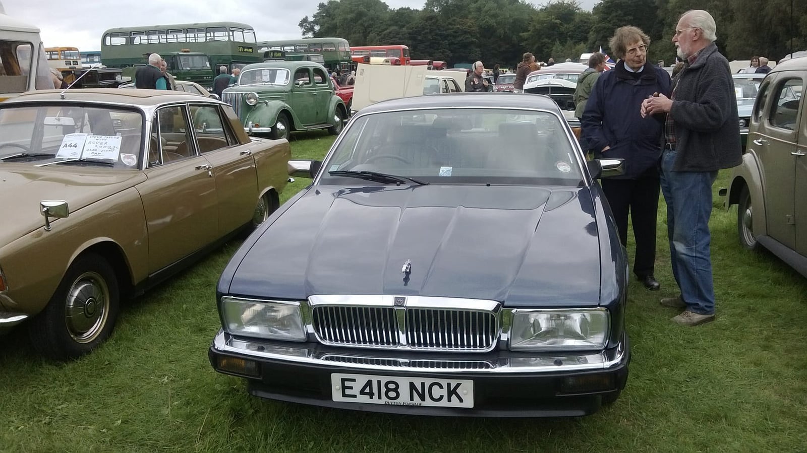 A dark blue 1988 Jaguar XJ40 saloon at a classic car show, front view