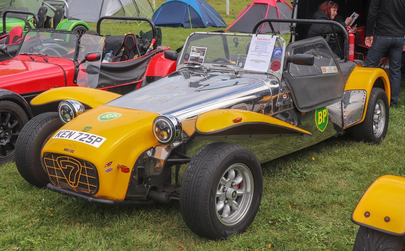 A red and yellow 1991 Robin Hood S3 Seven-style roadster, front view
