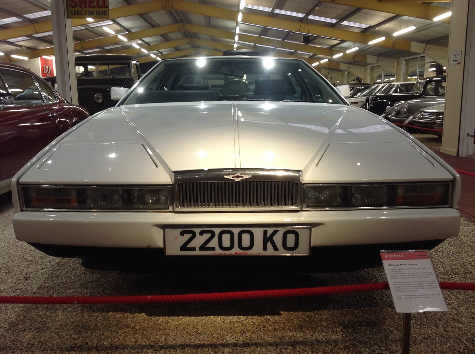 The flat nose of a white Aston Martin Lagonda with registration 2200 KO