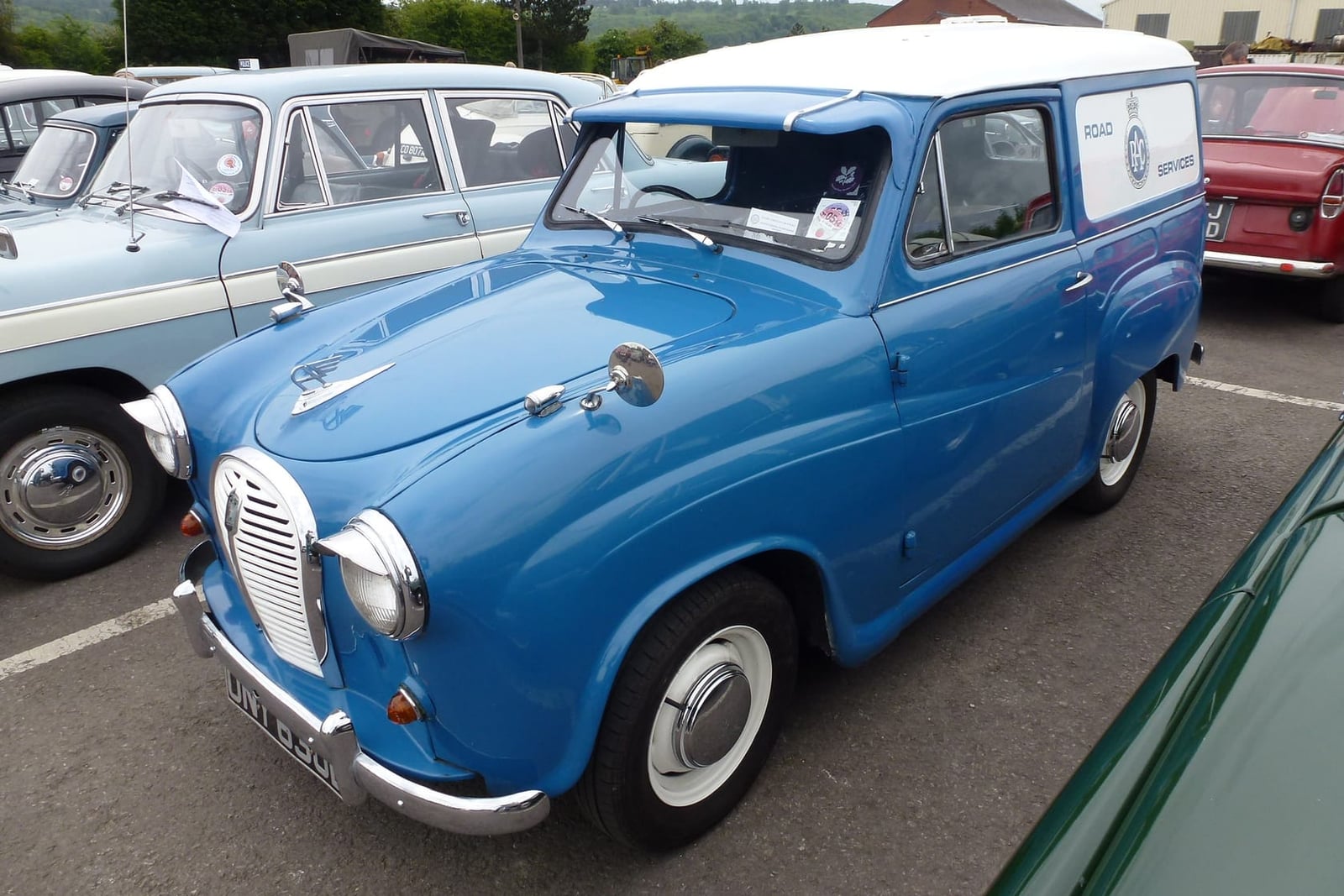 A blue and white 1967 Austin A35 van in RAC Road Service livery at a classic vehicle show
