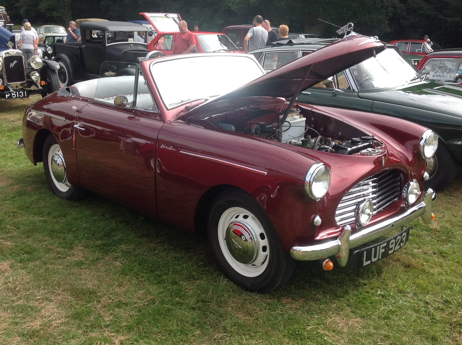 A maroon 1952 Austin A40 Sports convertible with UK registration LUF 826, built by Jensen
