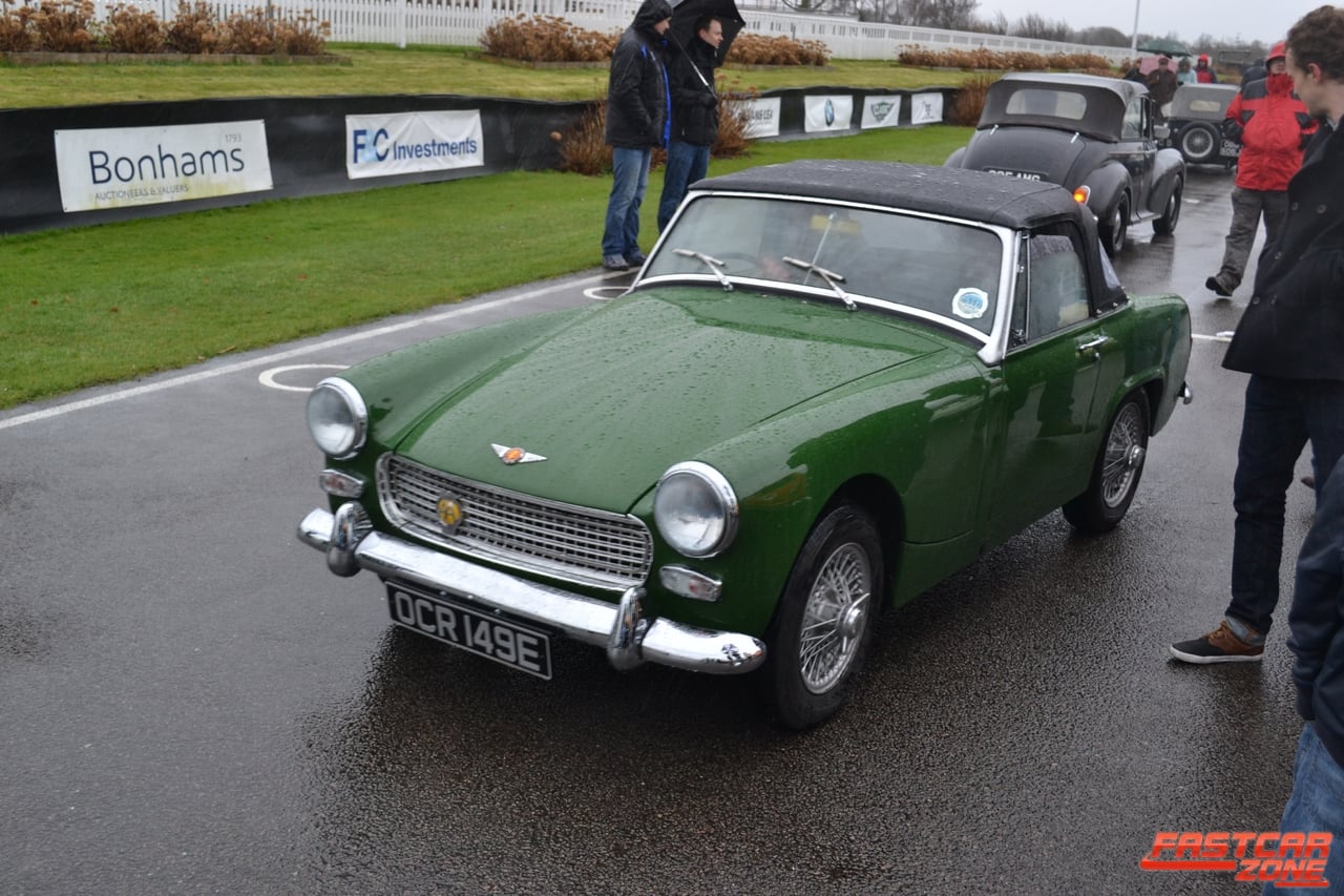 A green later Austin-Healey Sprite at a classic-car event