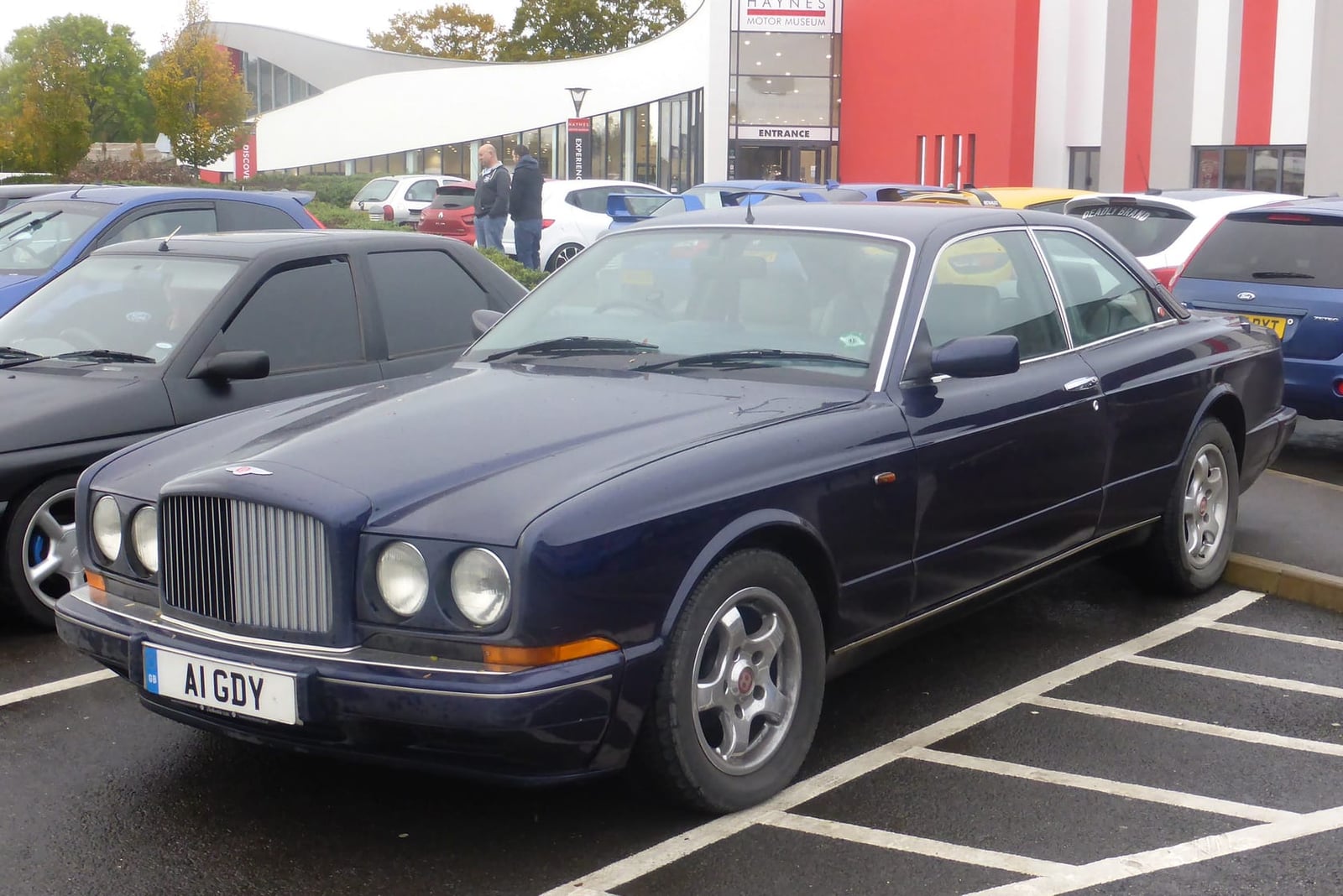 A dark blue 1995 Bentley Continental R with UK registration A1 GDY