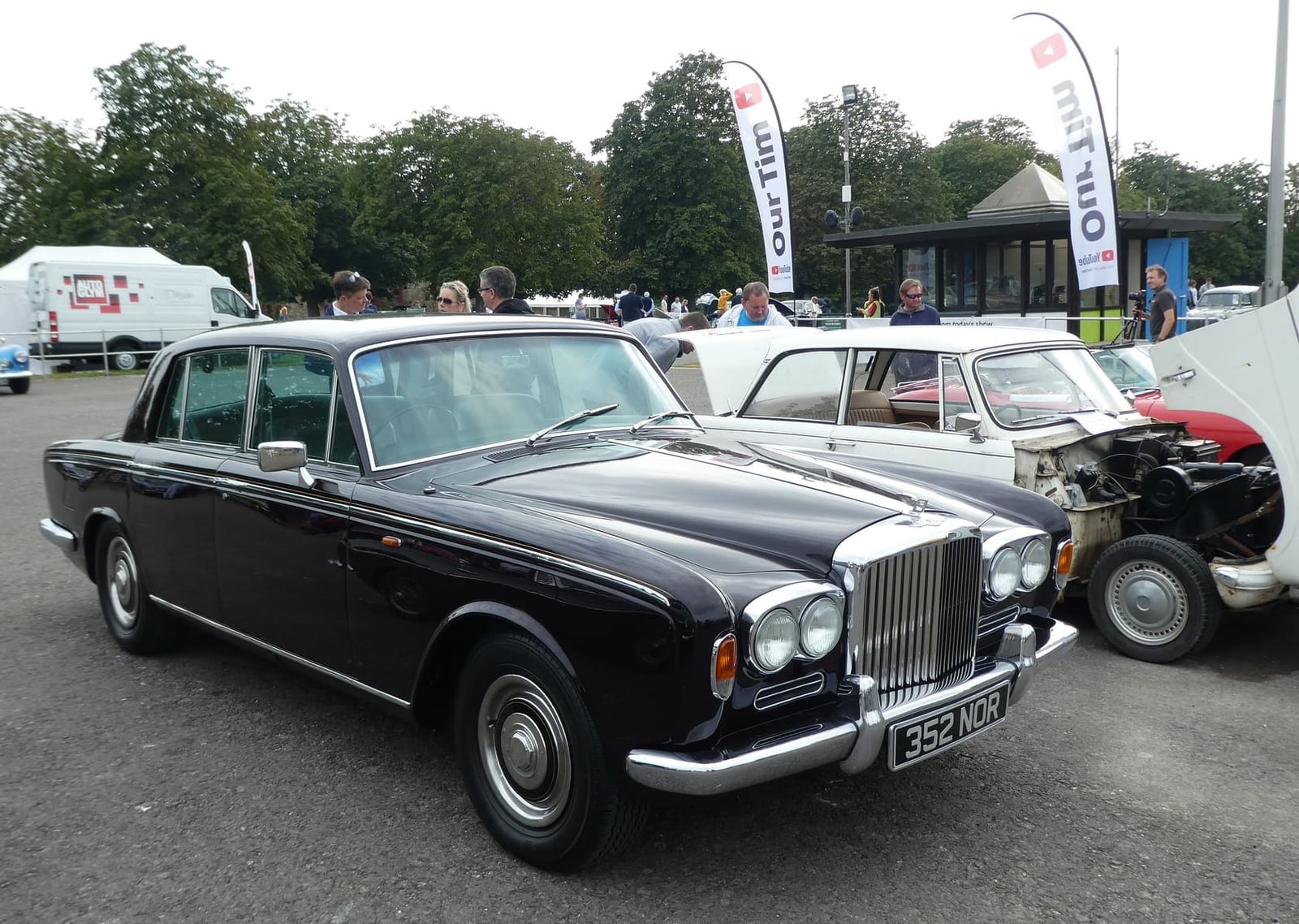 A black 1968 Bentley T-series at a classic vehicle event