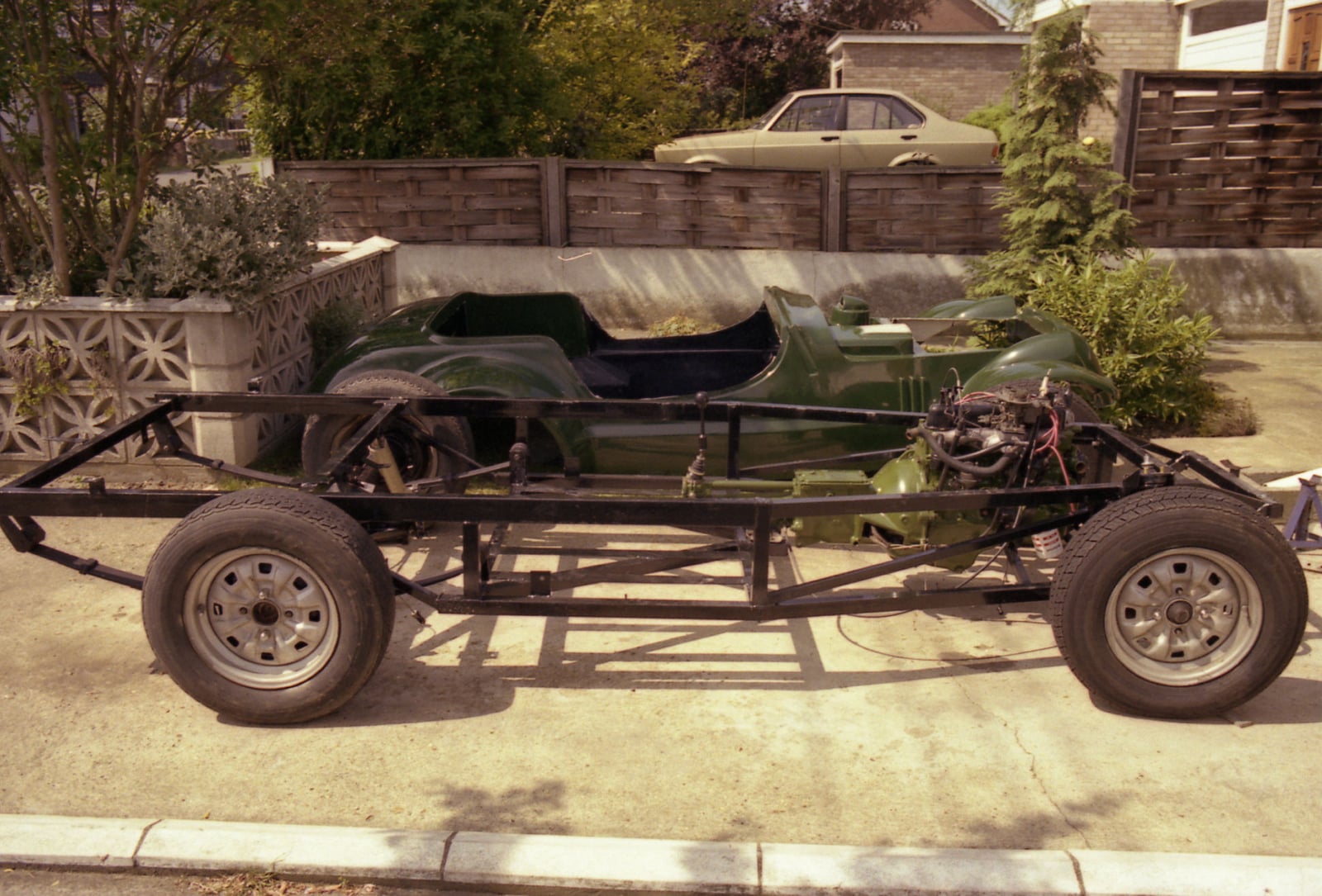 A bare Dutton steel ladder chassis with running gear fitted but no body
