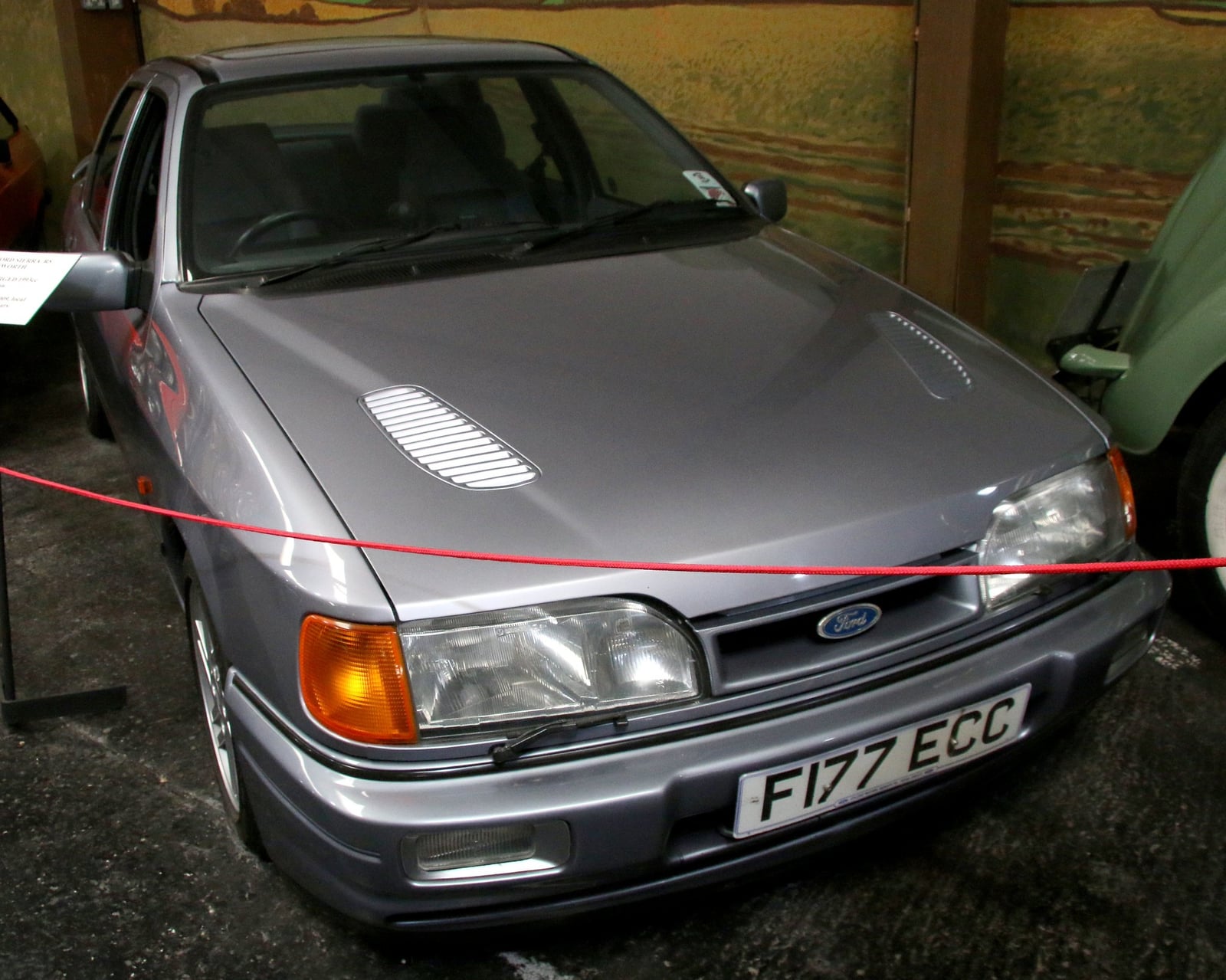 A silver three-door Ford Sierra RS Cosworth, front three-quarter view