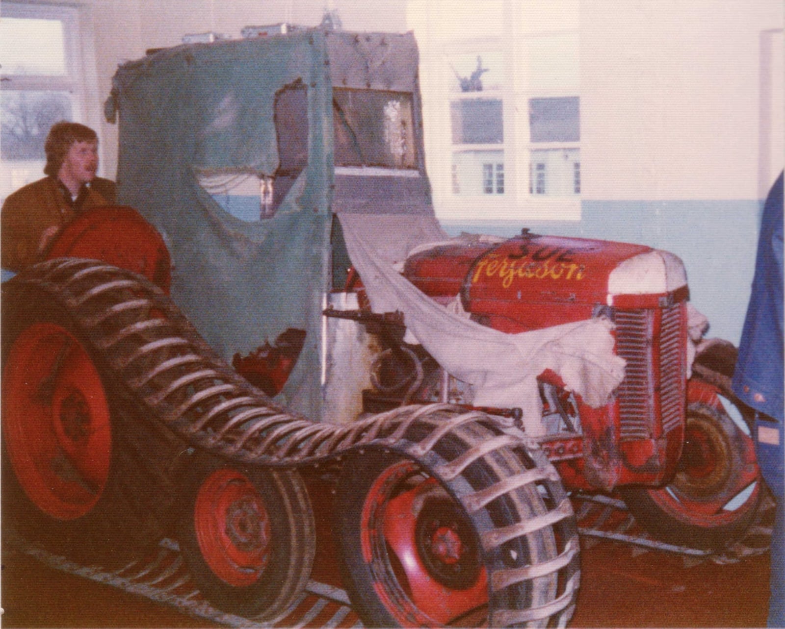 Edmund Hillary's tracked Ferguson TE20 expedition tractor with canvas cab, preserved indoors