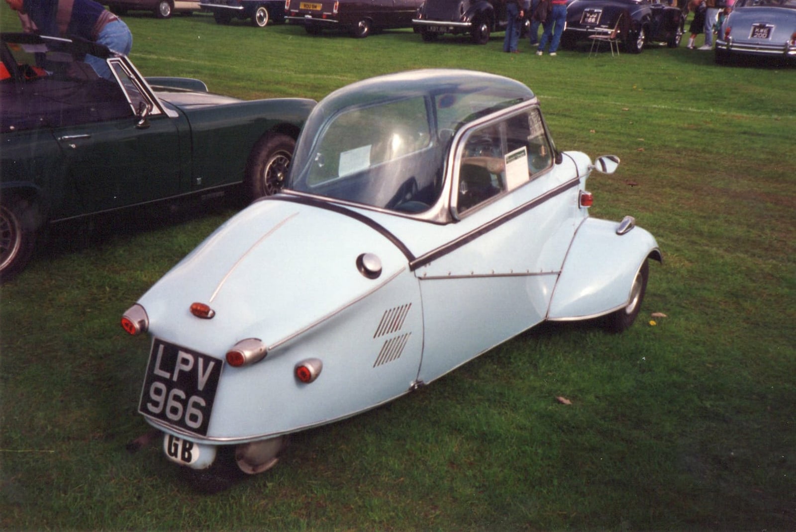 The rear three-quarter of a pale blue 1960 Messerschmitt Kabinenroller, UK registration LPV 966