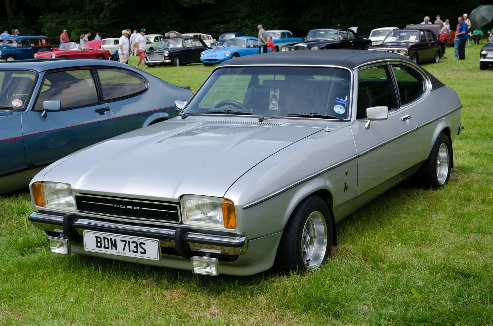 A gold Ford Capri 3.0 Ghia, side view