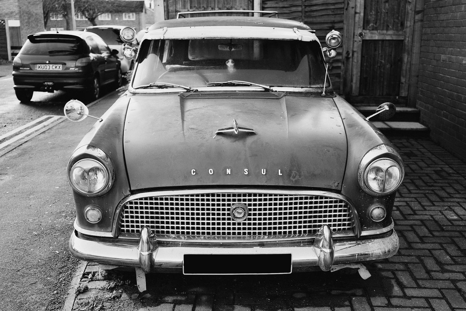 A black-and-white photograph of an early Ford Consul Mk1, front view