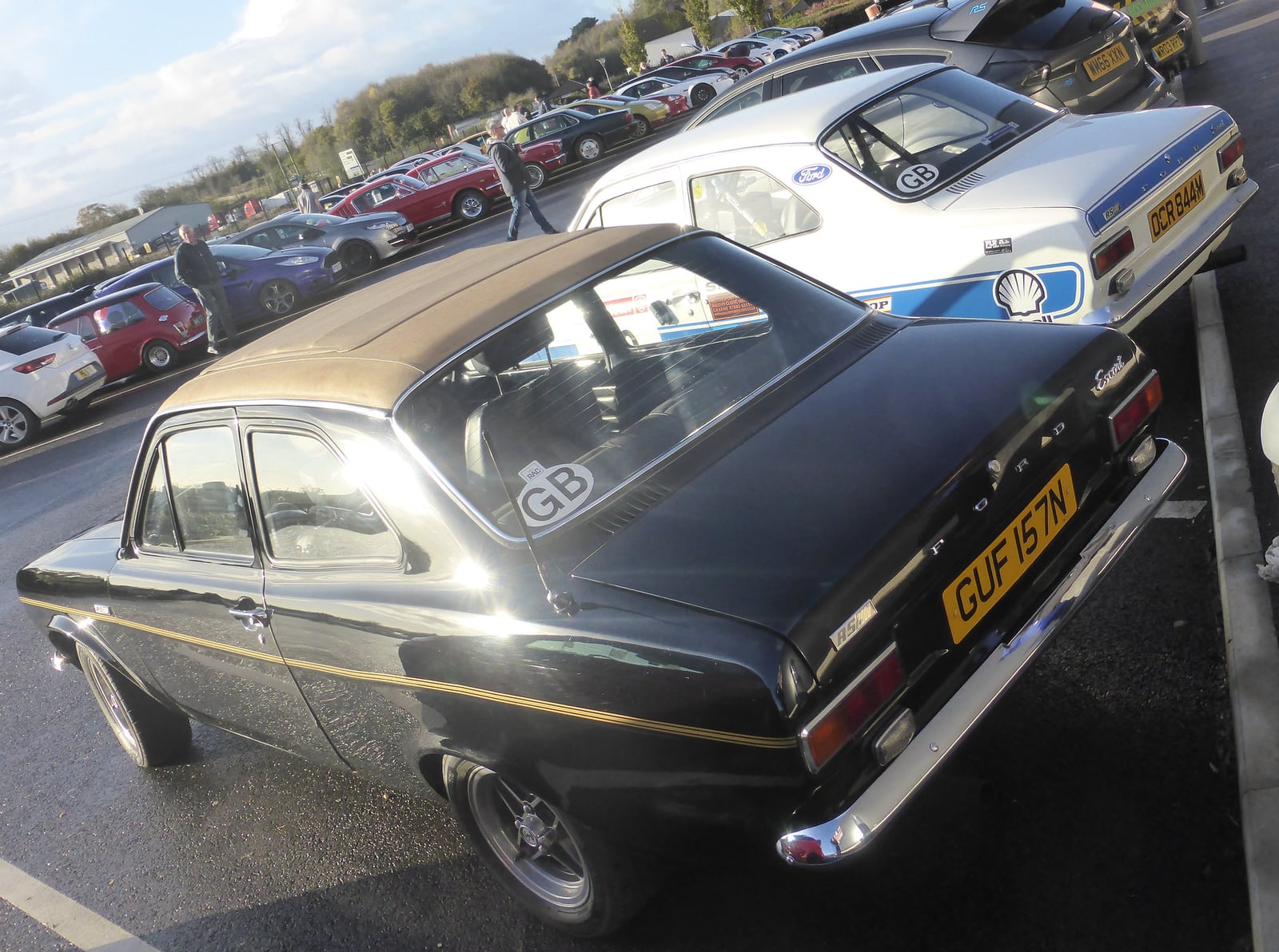 A beige Mk1 Ford Escort RS2000 at a show, front three-quarter view