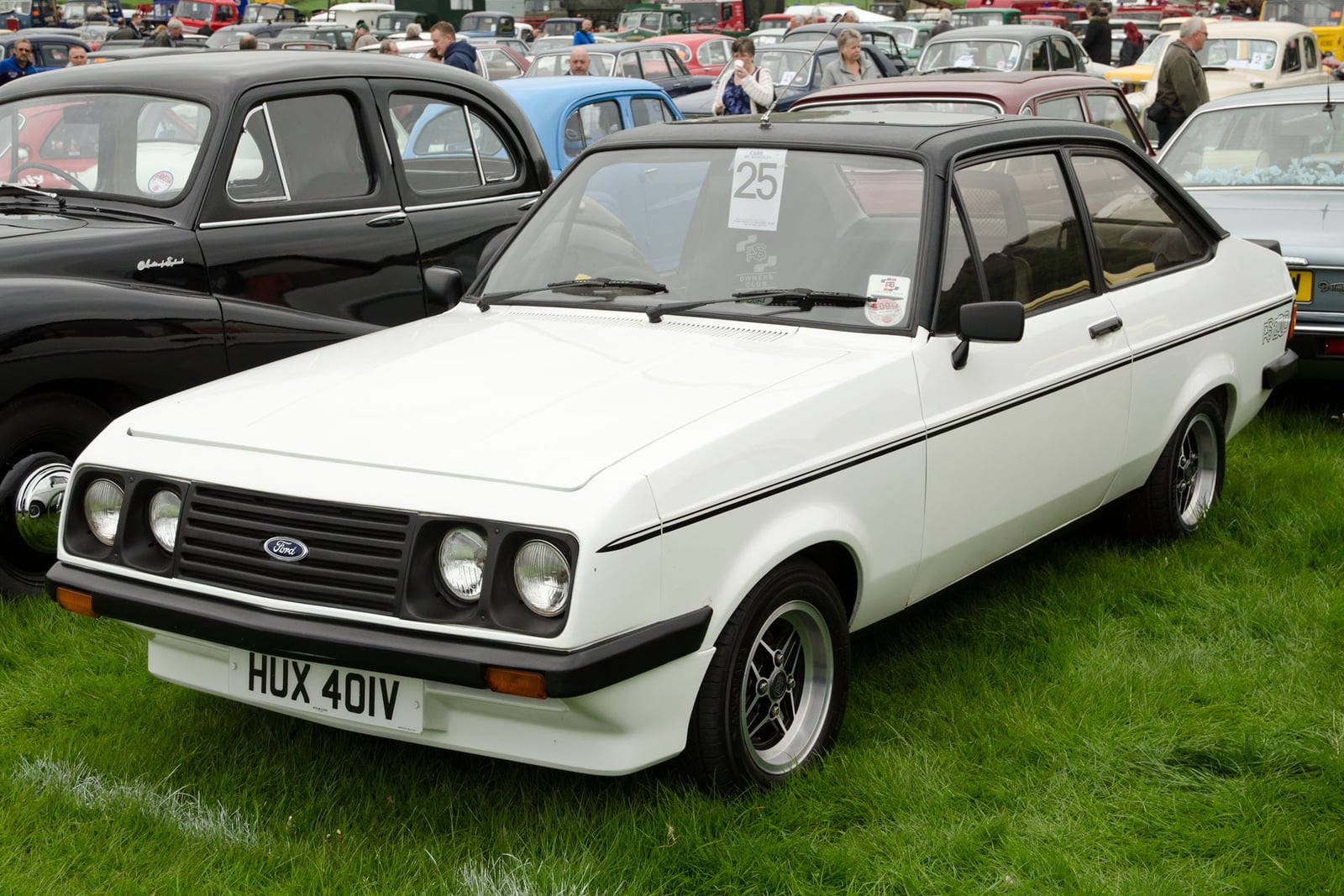 A white Mk2 Ford Escort RS2000, front three-quarter view