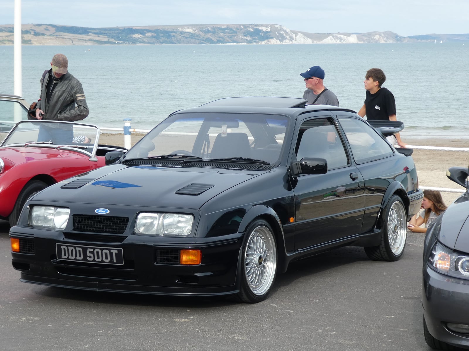 A black Ford Sierra RS500 Cosworth, front three-quarter view