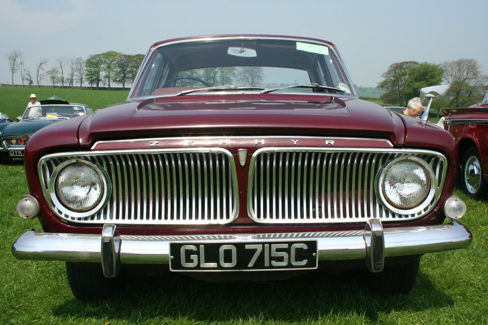 A maroon Ford Zephyr Mk3 saloon, head-on front view