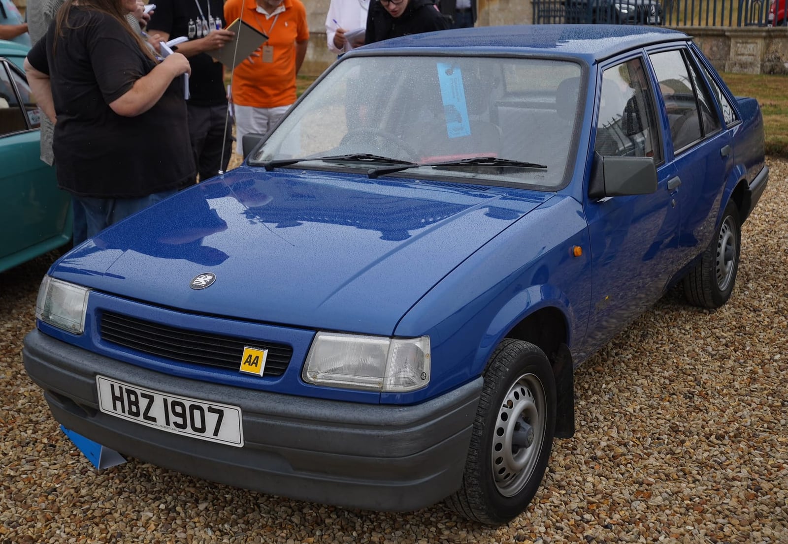 A blue Vauxhall Nova saloon with registration HBZ 1907