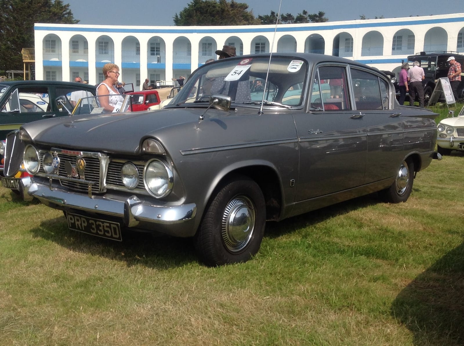 A grey 1966 Humber Sceptre on grass at a show, front three-quarter view, UK registration PRP 335D