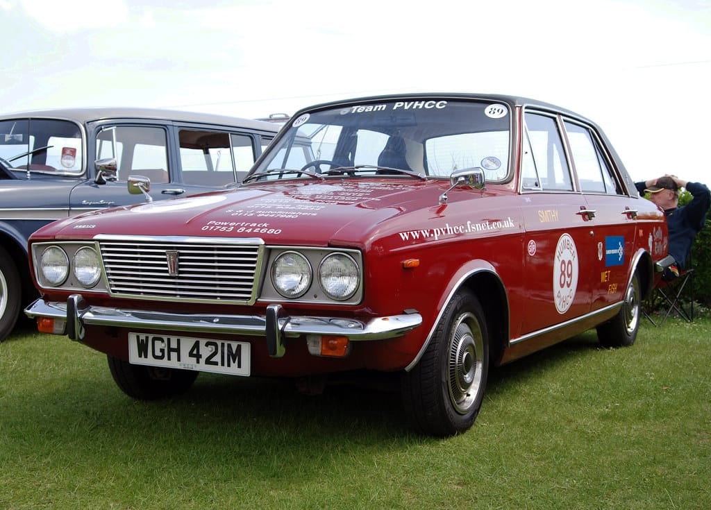A red Humber Sceptre prepared for historic rallying with auxiliary lamps and competition numbers, UK registration WGH 421M