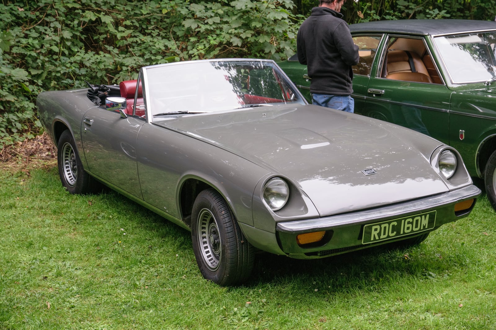 A grey Jensen-Healey with a hardtop fitted, front three-quarter view
