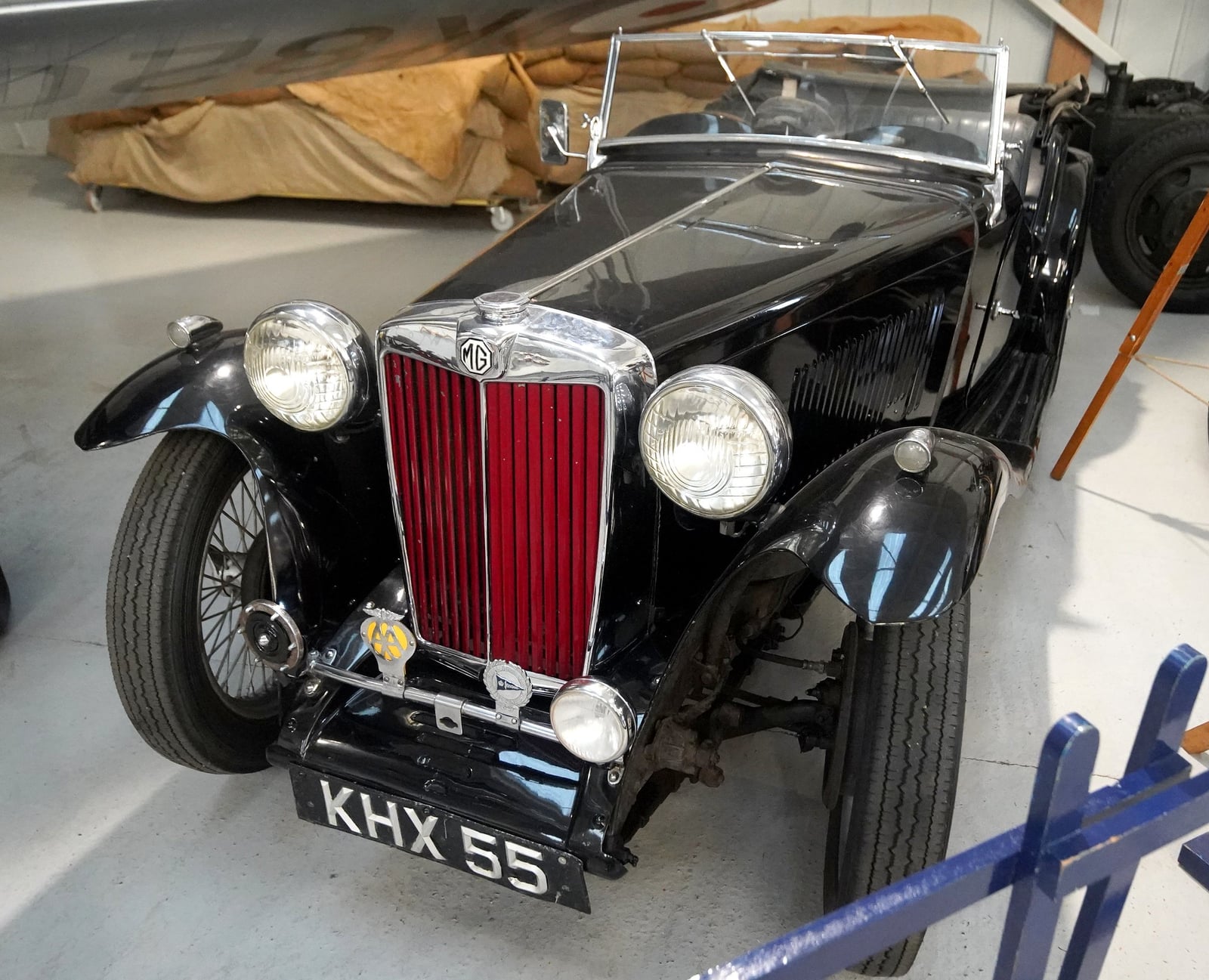 A black MG TA of 1939, front three-quarter view, UK registration KHX 55