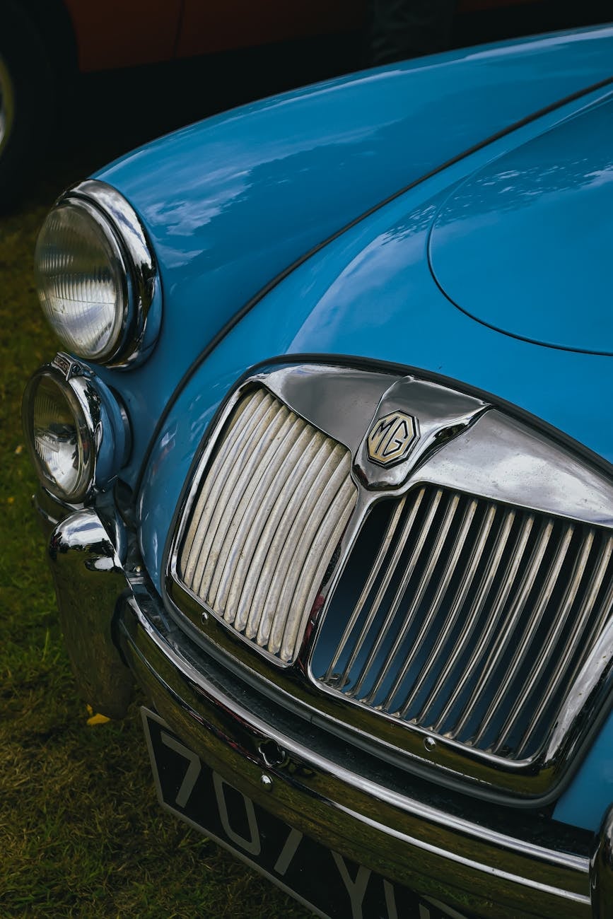 Close-up of the grille and MG octagon badge of a blue MG MGA