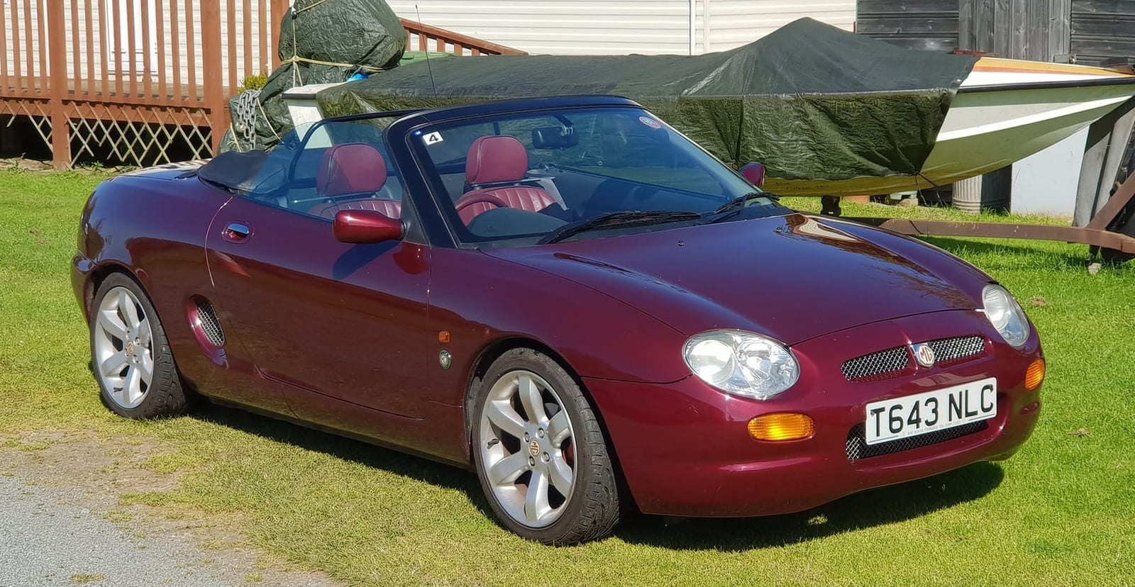A maroon 1999 MGF Anniversary with UK registration T643 NLC
