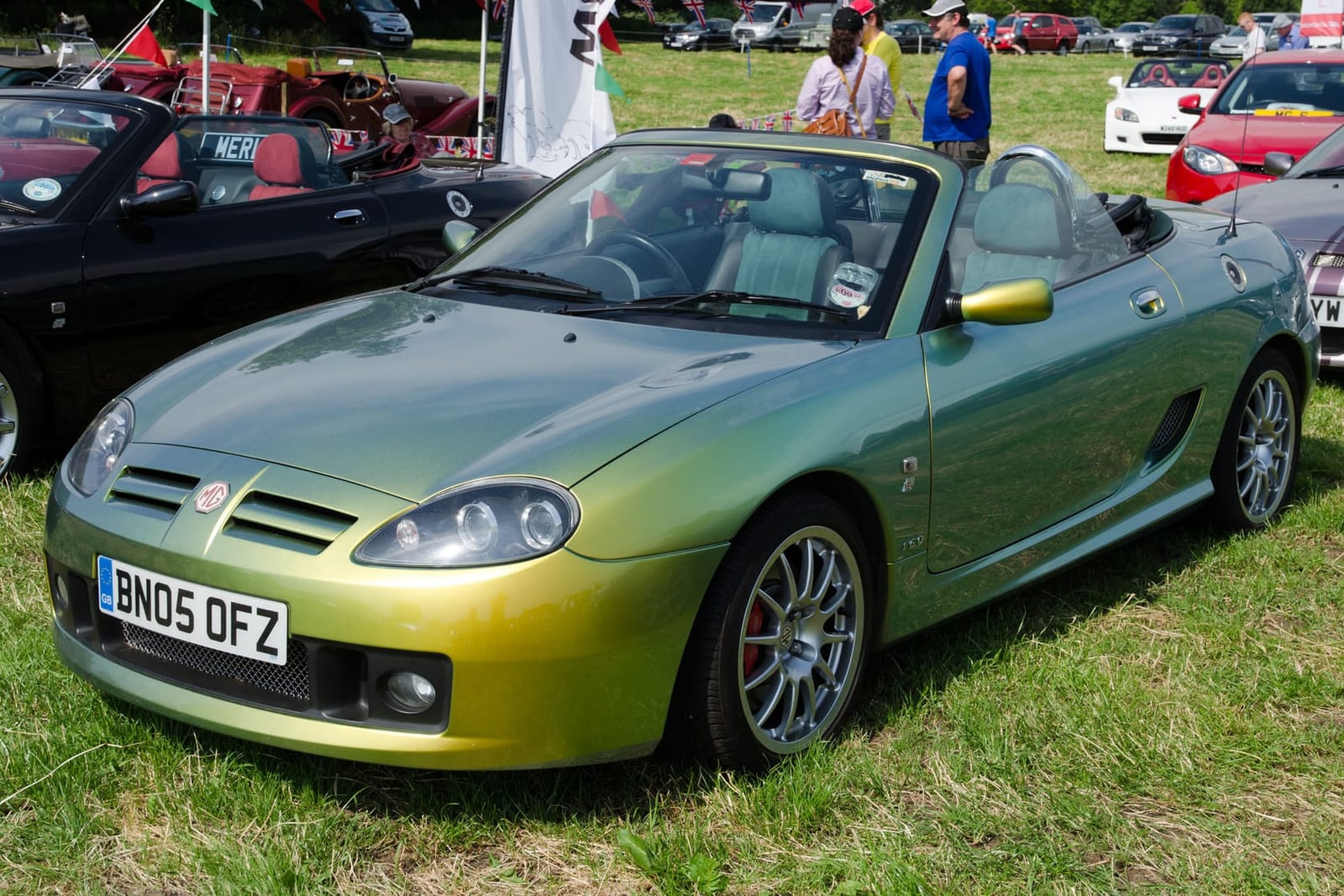 A chameleon-green 2005 MG TF with UK registration BN05 OFZ on a show field