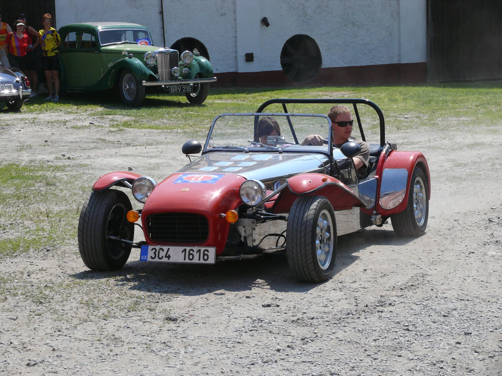 A red Robin Hood S7 Seven-style roadster, front three-quarter view