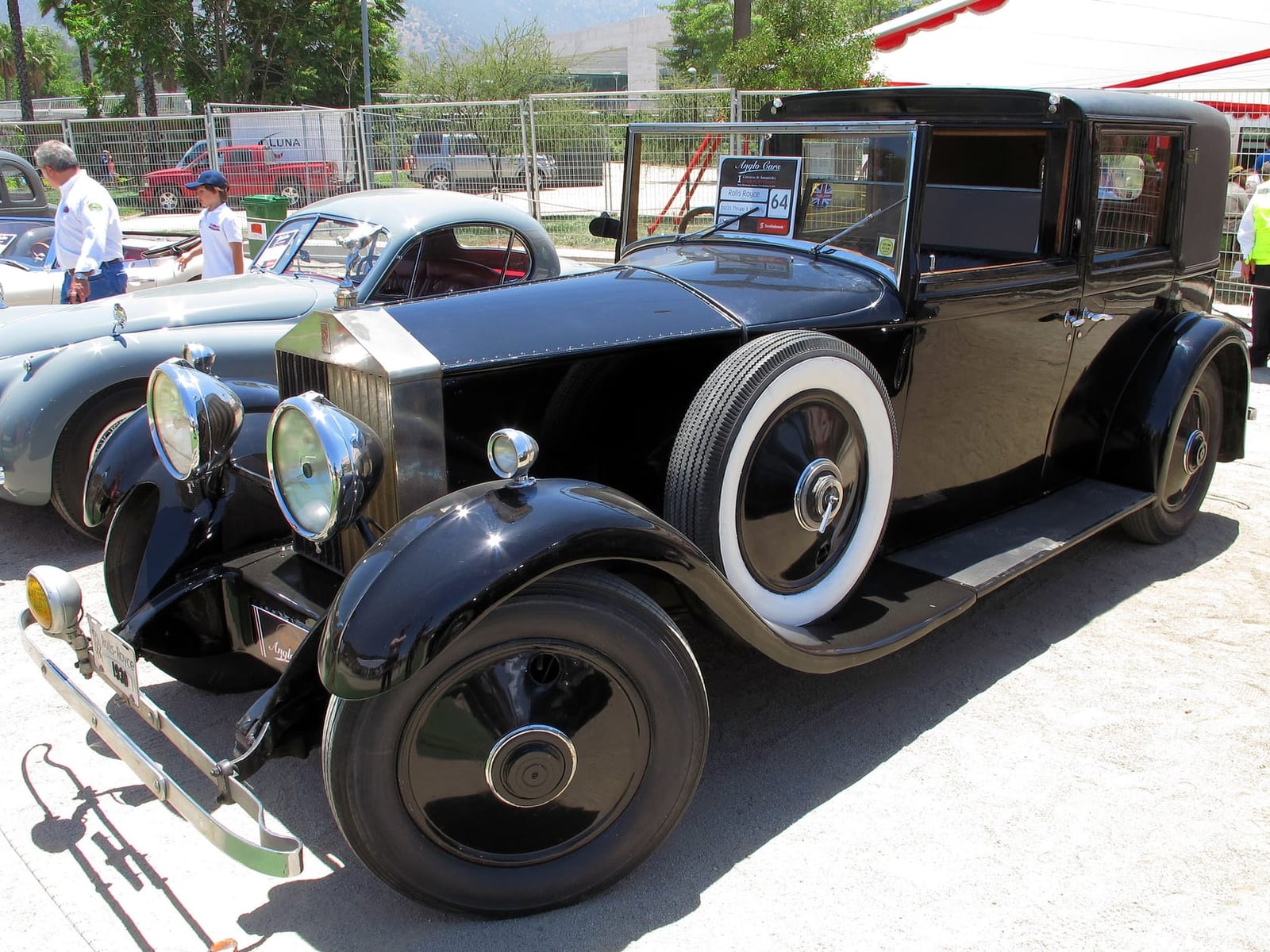 A black 1929 Rolls-Royce 20/25 sedanca by Thrupp and Maberly