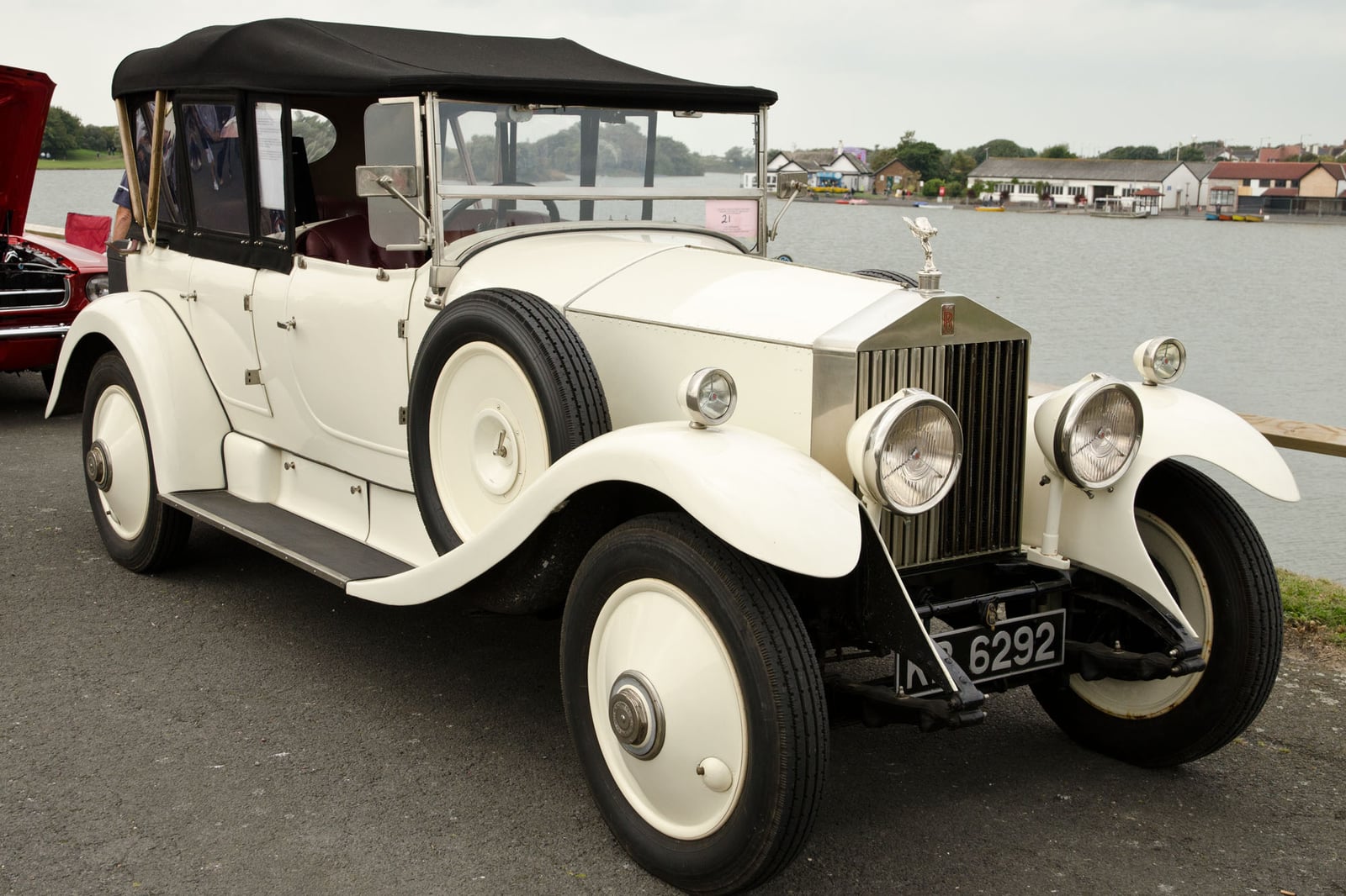 A cream 1929 Rolls-Royce Twenty open tourer with coachbuilt Barker body