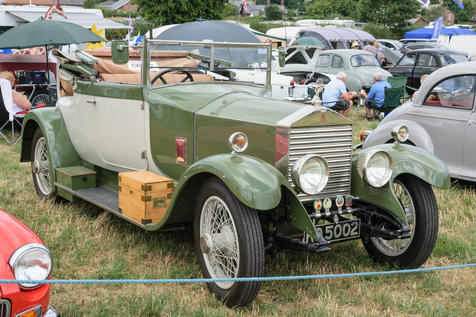 A green 1927 Rolls-Royce 20hp doctors coupe by Harrisons with UK registration 5002