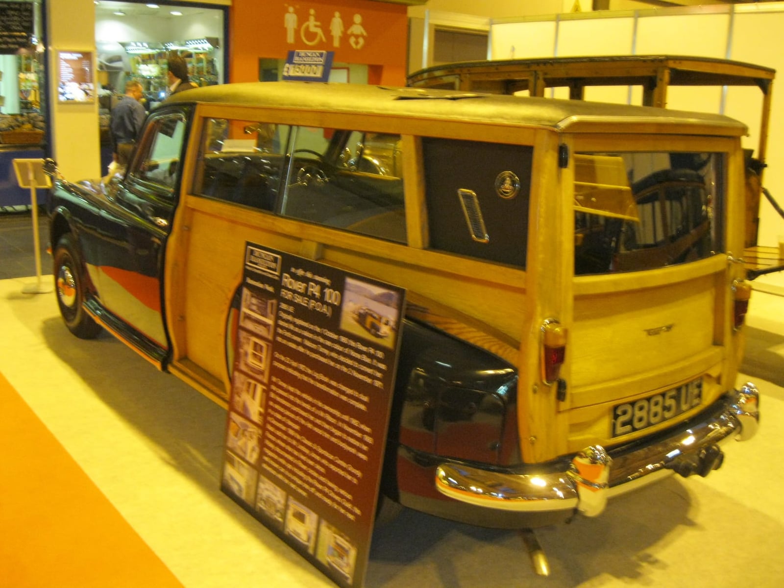 A Rover P4 converted into a wood-framed estate, displayed indoors with its rear door open