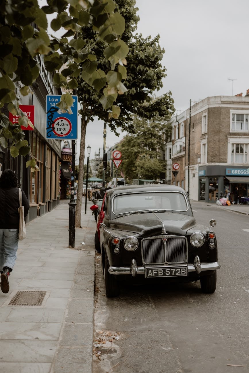 A black Rover P4 saloon, front three-quarter view