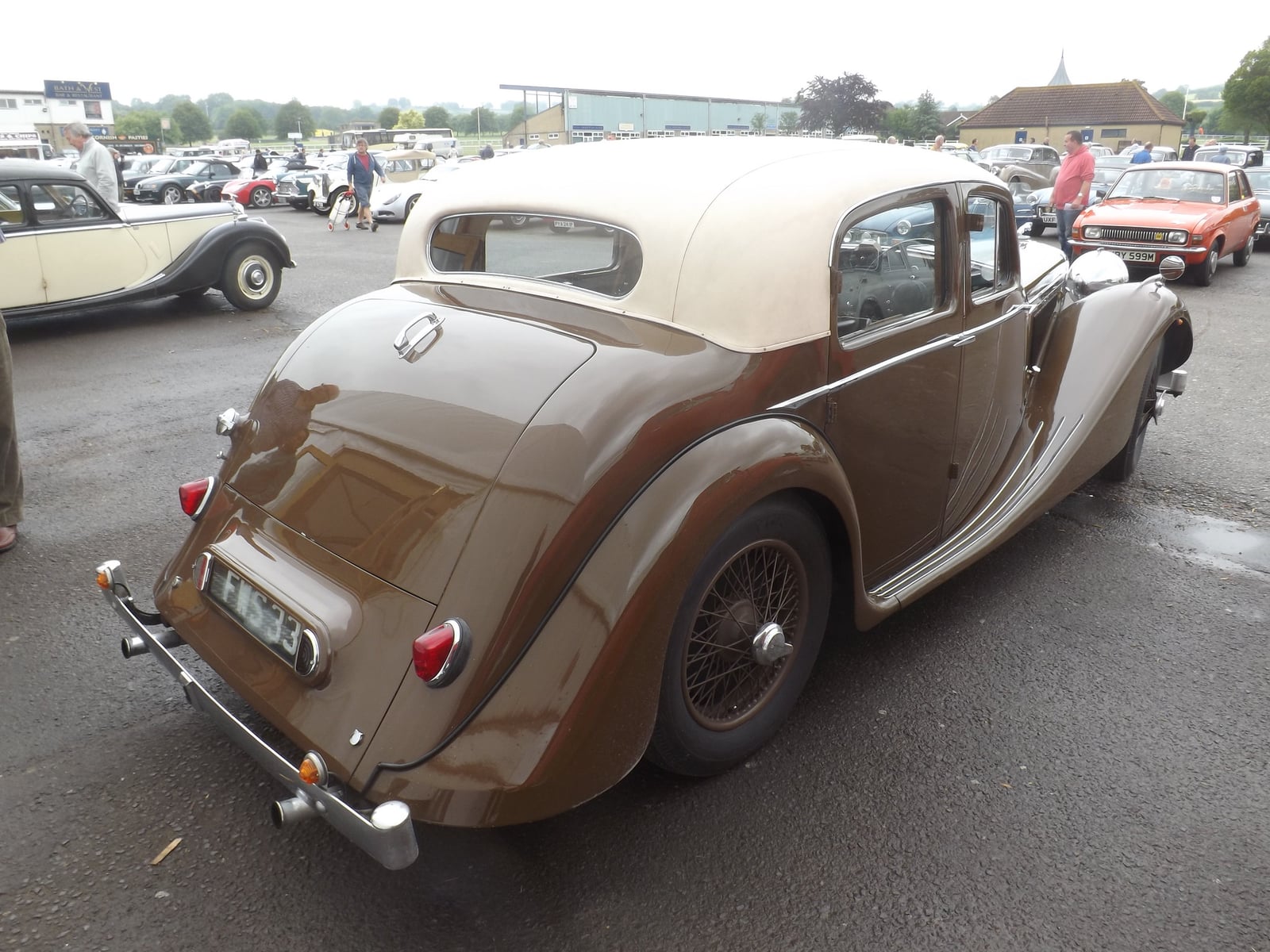 A brown SS Jaguar 3.5-litre saloon, rear three-quarter view