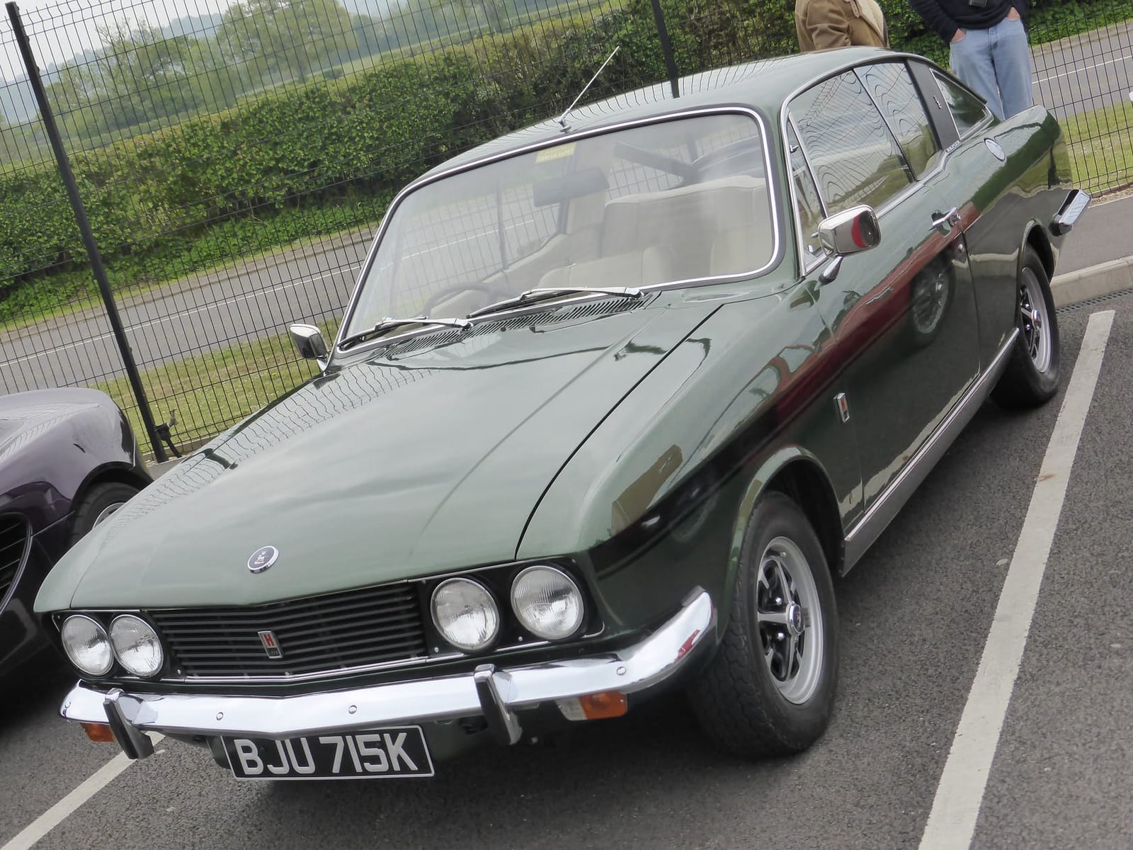A dark green Sunbeam Rapier H120, front three-quarter view, UK registration BJU 715K
